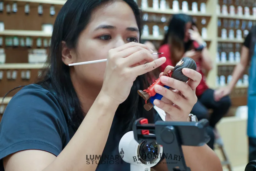 Close focus while painting a figure face